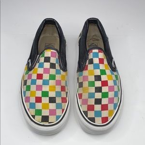 multi colored checkerboard slip on vans